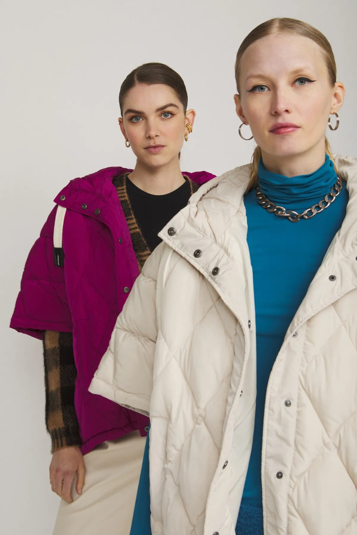 Cape-style puffer jacket