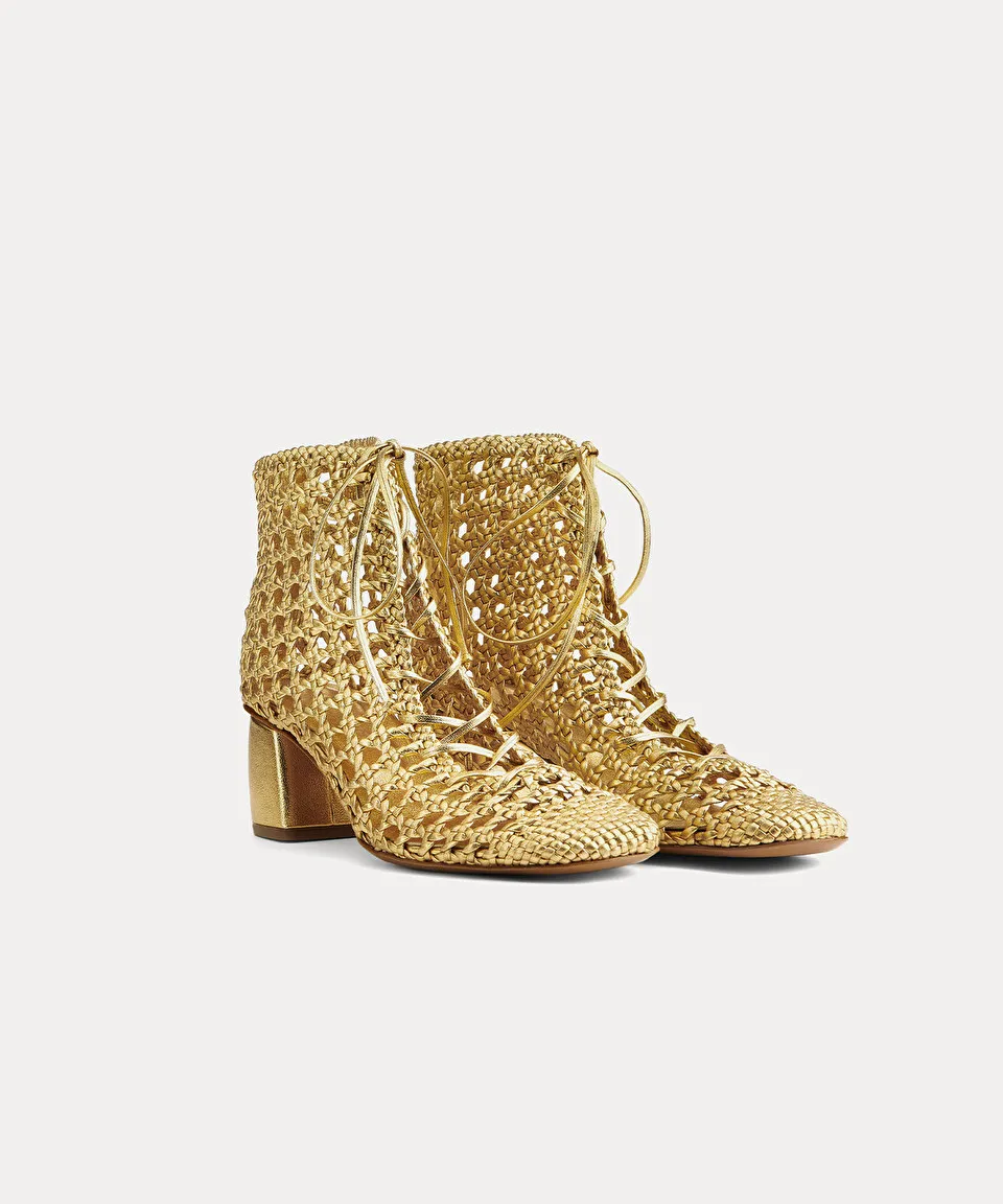chic hand–braided ankle boot