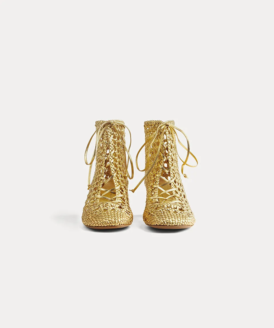 chic hand–braided ankle boot