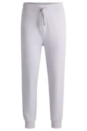 Cotton-terry tracksuit bottoms with logo print