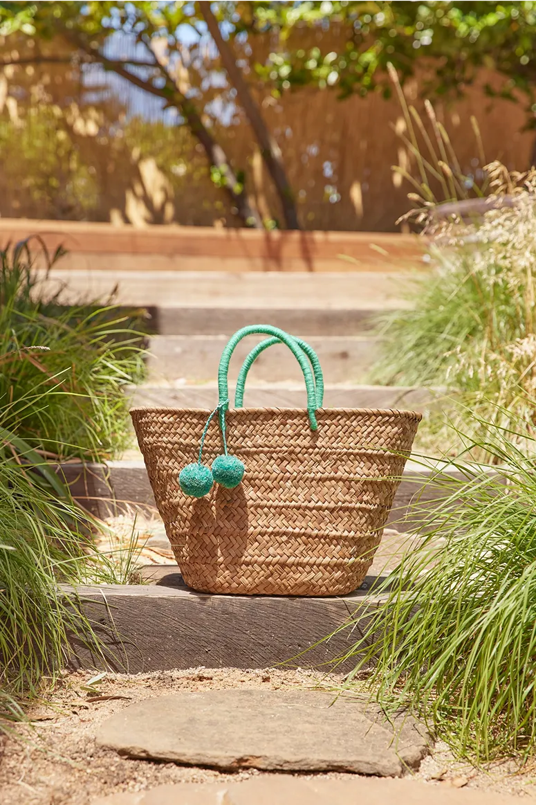 KAYU - St. Tropez Pom Pom Straw Tote - Seafoam Green