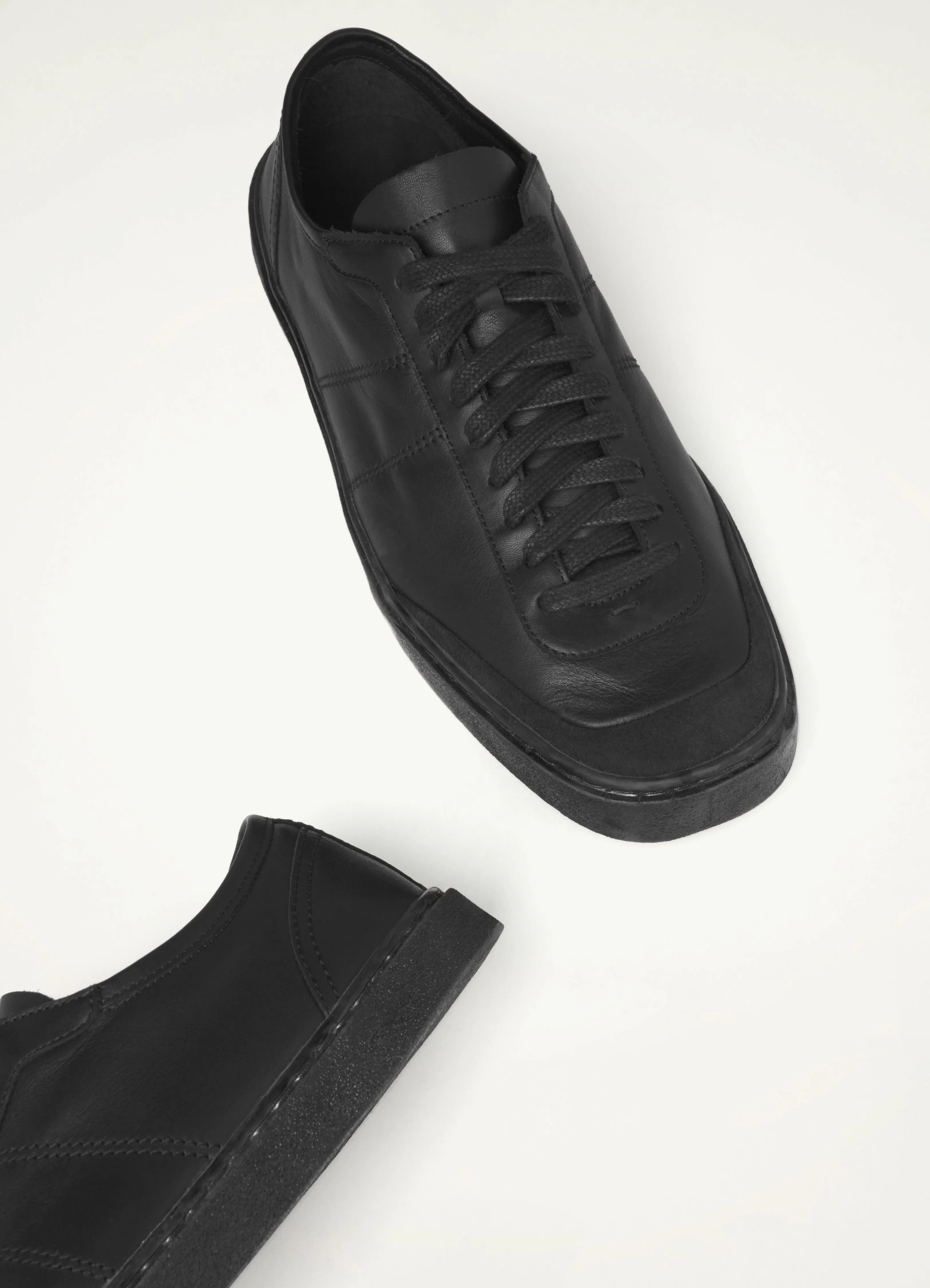 Lemaire Linoleum Laced Up Trainers (Black)