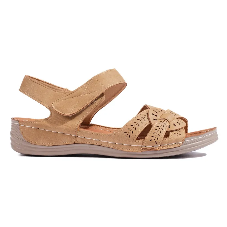 Light brown women's sandals with a low wedge