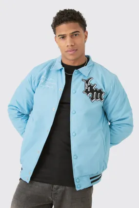 Nylon BM Badge Collared Varsity Bomber Jacket In Blue