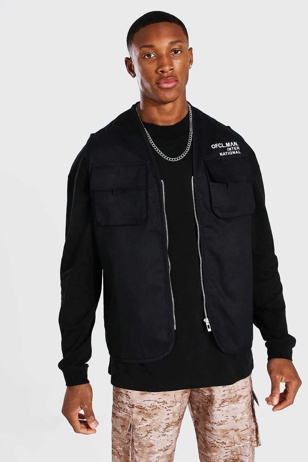 Official International Branded Utility Vest | boohooMAN UK