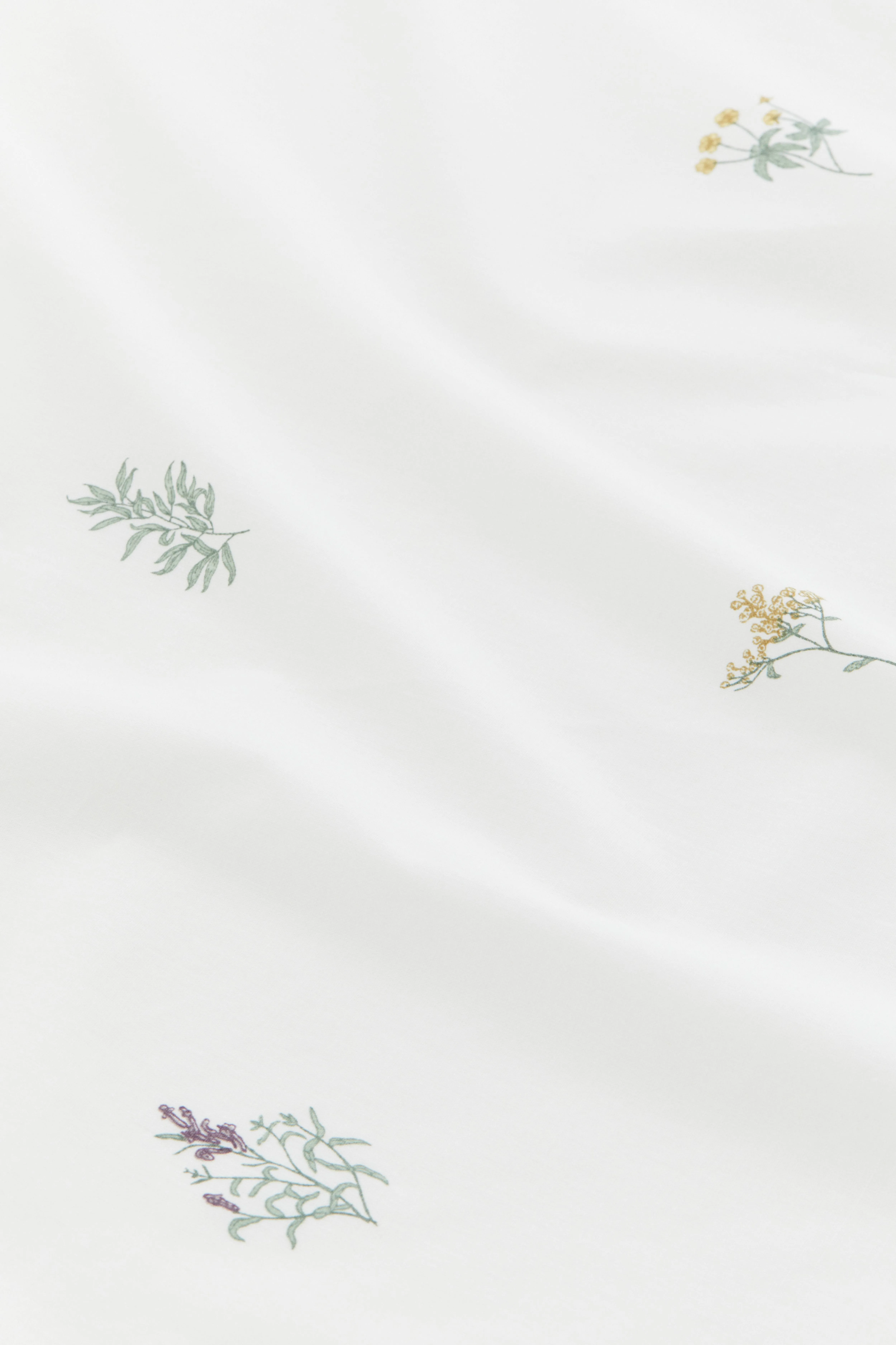 Patterned cotton fitted sheet - White/Floral - Home All | H&M GB