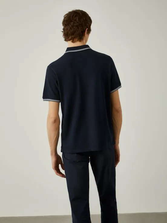 Piqué polo with contrast stripes