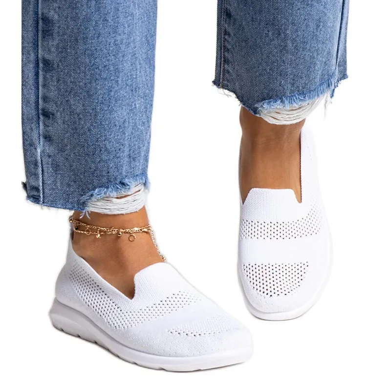 Rahim's white sneakers with a foam sole
