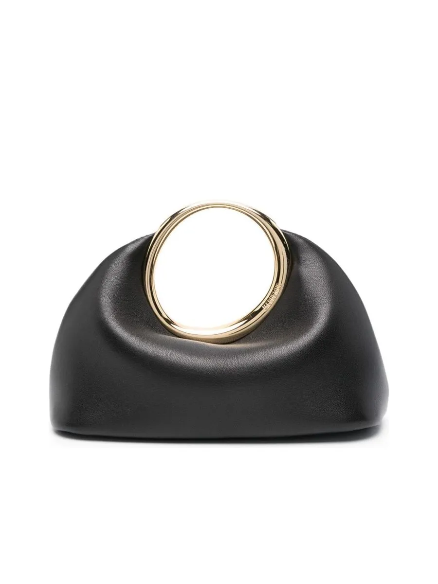 Smooth Grain Clutch With Circular Handle