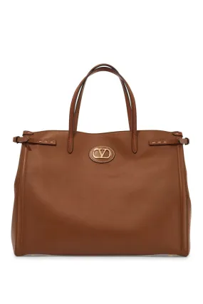 Valentino Garavani Borsa Tote Grande In Pelle Marrone Minimalista Con Fibbie Decorative
