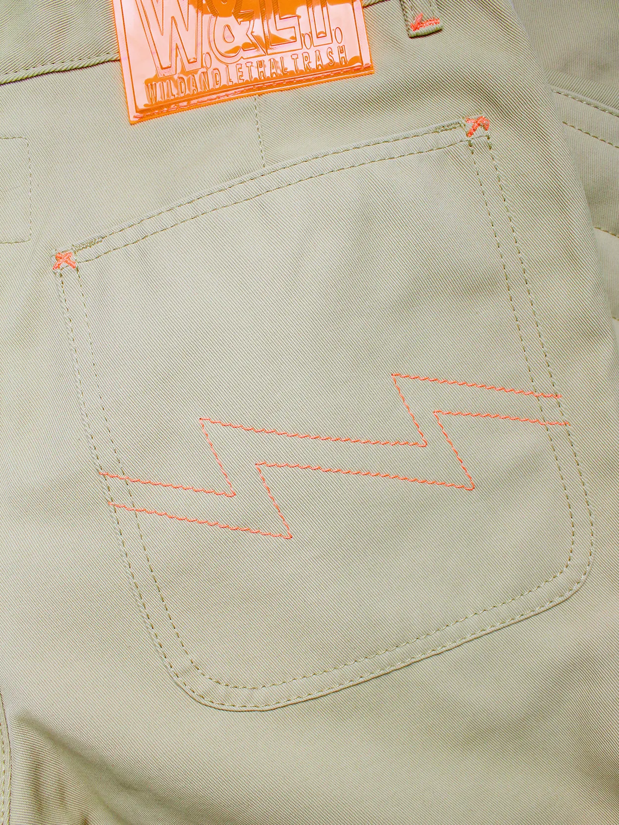 Walter Van Beirendonck W&LT beige trousers with kneepad pockets and neon orange details — 1990’s